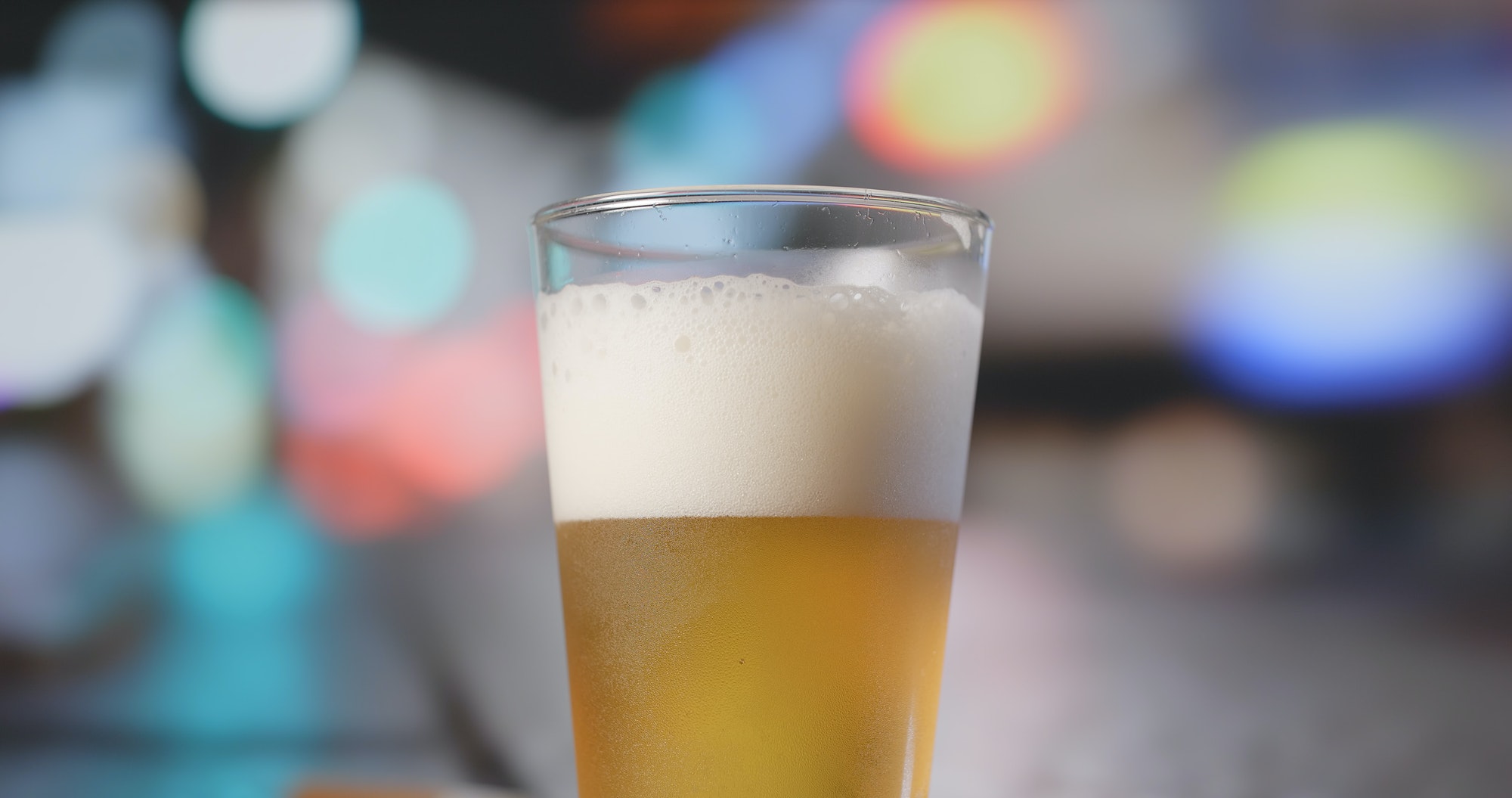 Beer with driving car at the background