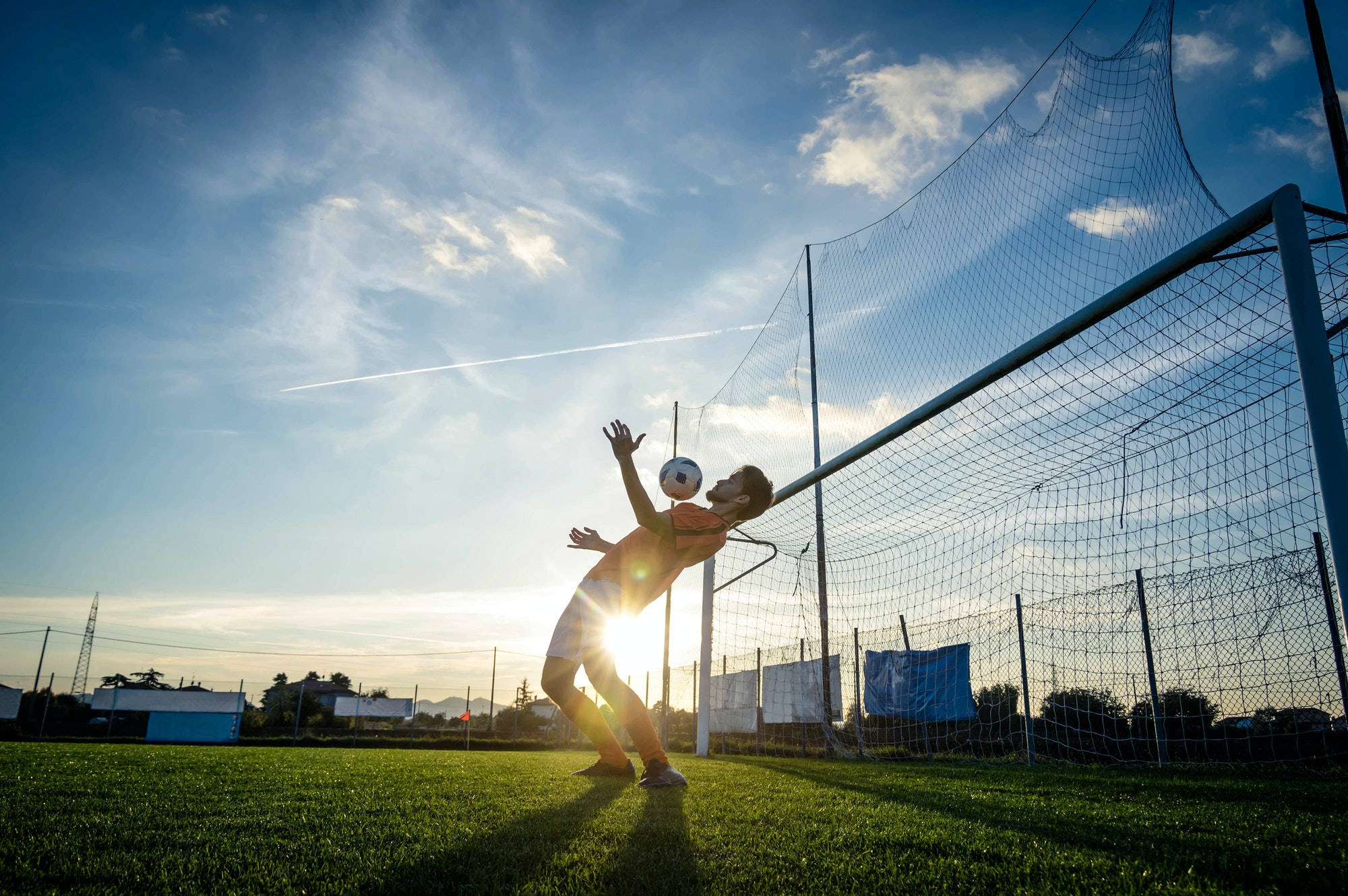 Soccer player in action on the soccer stadium