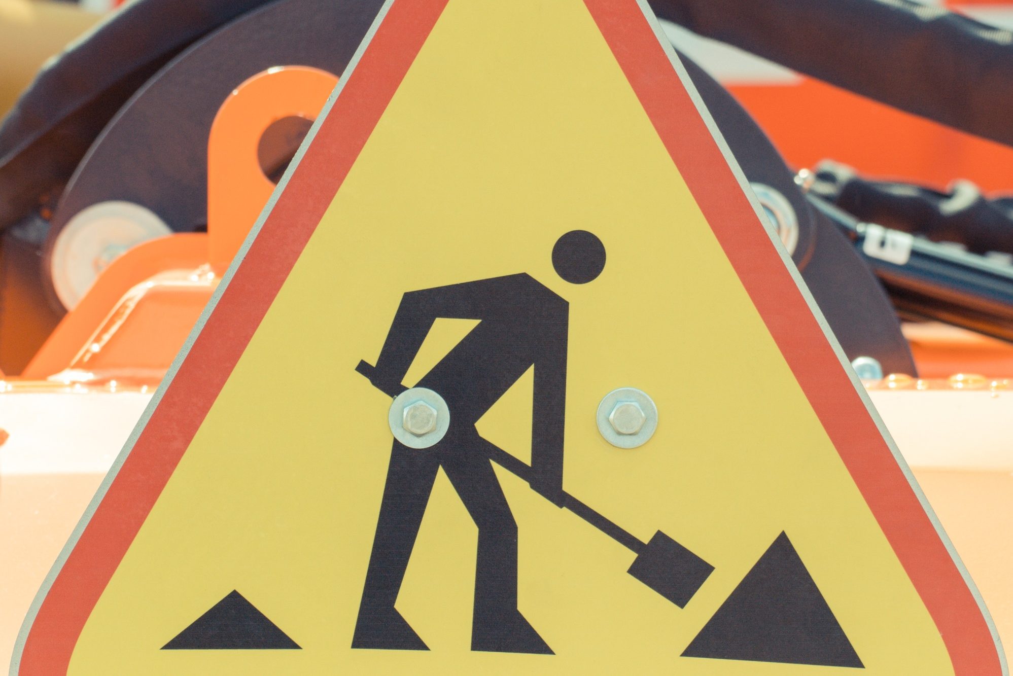 Roadsign informing about roadwork. Construction or repair road or pavement.